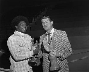 J. C. Garrett with his awards