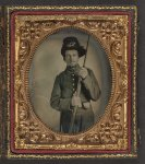 [Unidentified soldier in Union uniform and plumed infantry Hardee hat with bayoneted musket and cap box]