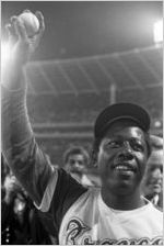 Hank Aaron holding the record breaking 715th home run ball, 1974