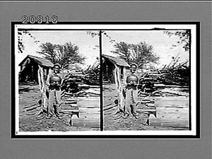 African American boy holding watermelon. Active no. 7229 : stereo interpositive.