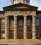 Heavily weathered columns of the Old Capitol Building in Springfield, the capital city of Illinois. It is the fifth capitol building built for the U.S. state of Illinois. It was constructed in the Greek Revival style in 1837-1840 and served as the state house from 1840 to 1876. It is the site of presidential candidacy announcements by Abraham Lincoln in 1858 and Barack Obama in 2007. Here, Lincoln tried cases as a lawyer and delivered his famous "House Divided" speech in 1858