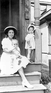 Rosella Gardner with her children, Rosella and William, dressed up for the Eucharistic Congress in St. Paul