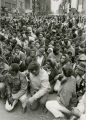 Kneeling in prayer on street