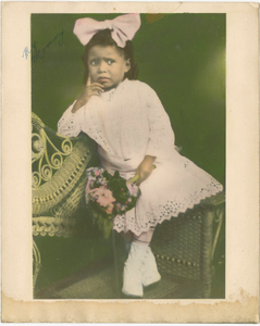 Tinted photograph of young Mae Reeves