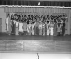 Students on stage in the auditorium of Goodwyn Junior High School at 209 Perry Hill Road in Montgomery, Alabama.