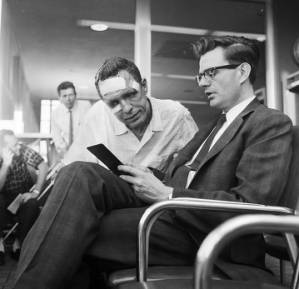 Freedom Rider James Peck with another man in the waiting area of the airport in Birmingham, Alabama, waiting to board a flight for New Orleans.