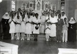 First Communion Group Portrait by Altar on Easter Sunday, St. Peter Church, Dallas, Texas, 1938