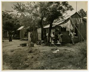 Family Outside Their Home