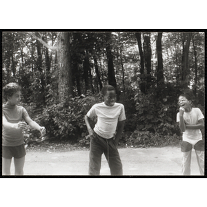 A Group of boys dancing in a group activity at a camp