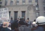 Hosea Williams speaking to demonstrators outside the Jefferson County courthouse in Birmingham, Alabama, during the incarceration of Martin Luther King, Jr., and several other civil rights leaders.