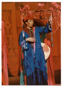 Thumbnail for Performance photo of a woman in a blue robe]. [color photoprint