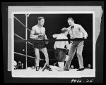 [Untitled photo shows: Henry Armstrong, boxing champion, with his opponent Lew Jenkins and referee Arthur Donovan at the Polo Grounds, New York]