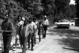 Group marching down an unpaved road in Prattville, Alabama, during a demonstration sponsored by the Autauga County Improvement Association.