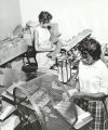 Lillie Crouther and Shirley Johnson operating office equipment