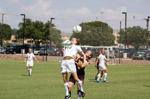 Danielle Herron jumping to the ball