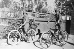 Boys in berets on bikes