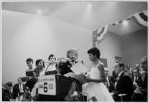 Betty Bentz presents Elizabeth Eckford, Minnijean Brown, Melba Beals, and Carlotta Walls with the Local 6 Civil Rights Award, New York, NY, 1958