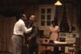 Actors and actress in a scene from the play A raisin in the sun