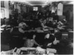 U.S. Office of War Information and U.S. Office for Emergency Management newsrooms, Washington, D.C. 1942-1943. Negro girl operators using teletype machines to disseminate war news to all parts of the country