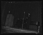 Paul Robeson on stage with man at piano, California Labor School