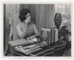 Thumbnail for Elreta Alexander at her desk