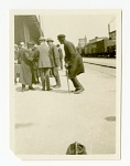 African-American Man Dancing at Railroad Station