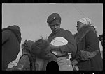 [Untitled photo, possibly related to: Negroes in the lineup for food at mealtime in the camp for flood refugees, Forrest City, Arkansas]