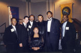 Ethnic Alumni Association members pose for a picture at a formal event, 2001