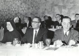 Mary Peter Clover, Robert Thomas, and Mel Hosch at a dining event