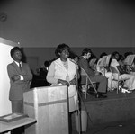 Woman and Man at Podium, Los Angeles, 1973