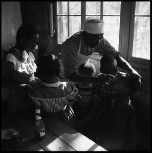 Oliver Jacobs Attending to His Grandchildren