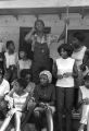 Thumbnail for Edward Rudolph and others, standing on the porch of the Autauga County Improvement Association office in Prattville, Alabama, on the day of a civil rights march.