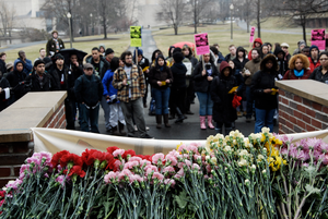 Justice for Jason rally at UMass Amherst: flowers and protesters outside the Student Union Building in support of Jason Vassell