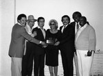 Renaldo Rey, George Kirby and others pose at the Pied Piper Club, Los Angeles, 1984