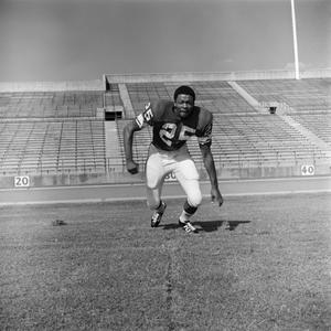 Football player running in his uniform