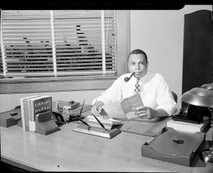 Mr. Reason at his office [acetate film photonegative]