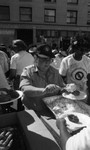 Friends feeding friends, Los Angeles, 1986