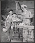 Lena Horne, unidentified child actor, and Ricardo Montalban in the stage production Jamaica