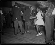 "High Hat," dance and party, African-American party, on Auburn Avenue, Atlanta, Georgia, January 21, 1943. Photo shoot commissioned by fashion and home-goods mail-order merchandizer, Chicago Mail Order Company, owned by Alden's