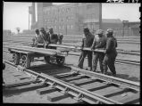 Section gang working on railroad track, Chicago, May 1948