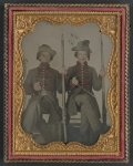 [Two unidentified soldiers in early war Mississippi uniforms with muskets and bayonets]