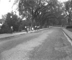 Students walking on campus at Tuskegee Institute in Tuskegee, Alabama.