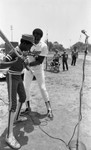 Dodger training young athletes at the Watts Baseball Clinic, Los Angeles, 1982