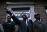 Fred Shuttlesworth speaking to demonstrators outside the Jefferson County courthouse in Bessemer, Alabama, protesting the incarceration of Martin Luther King, Jr., and several other civil rights leaders.