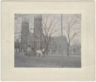 Trinity Cathedral with milk cart in front, African-American driver