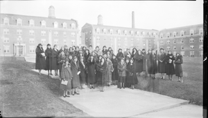 Group of women at Girls' Dormitory, Howard University, wearing winter coats, ca. 1931 : cellulose acetate photonegative, banquet camera format