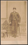 [Unidentified soldier in Union uniform with amputated leg, standing with crutches]