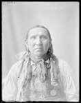 Dakota man, Point At Us Bow. U. S. Indian School, St Louis, Missouri 1904