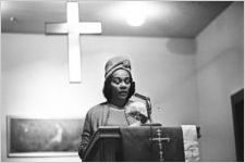 Coretta Scott King speaking to an audience of women at Hall Street Baptist Church in Montgomery, Alabama.