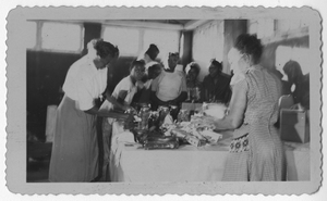 Photograph of African American women preparing an exhibit, Manchester, Georgia, 1953